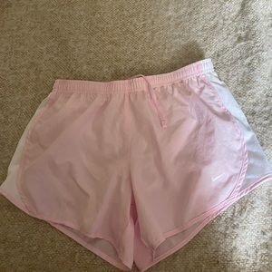 Pink and white nike workout shorts, size large